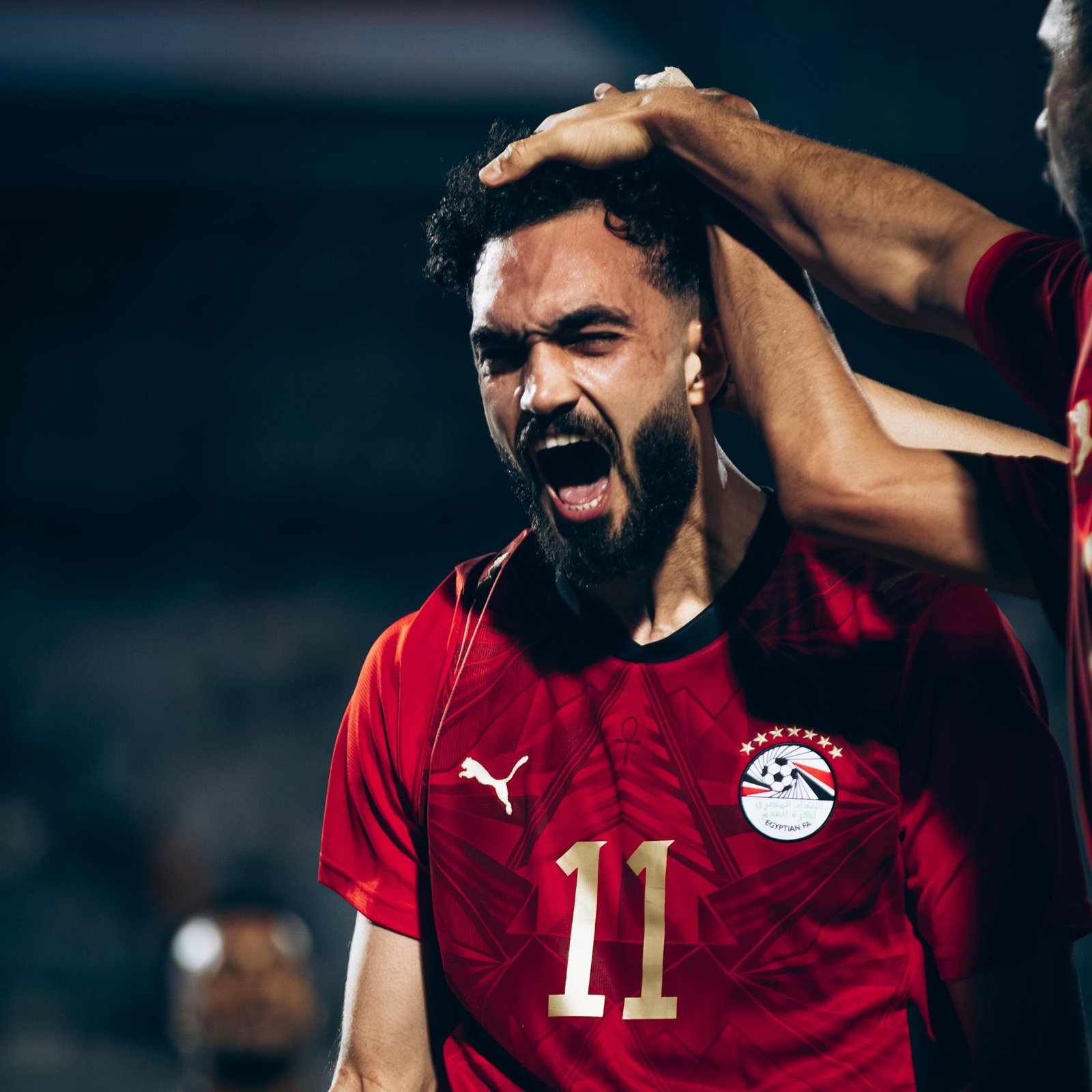 لاعب منتخب مصر مصطفى زيكو يحتفل بأهدافه في كأس العالم